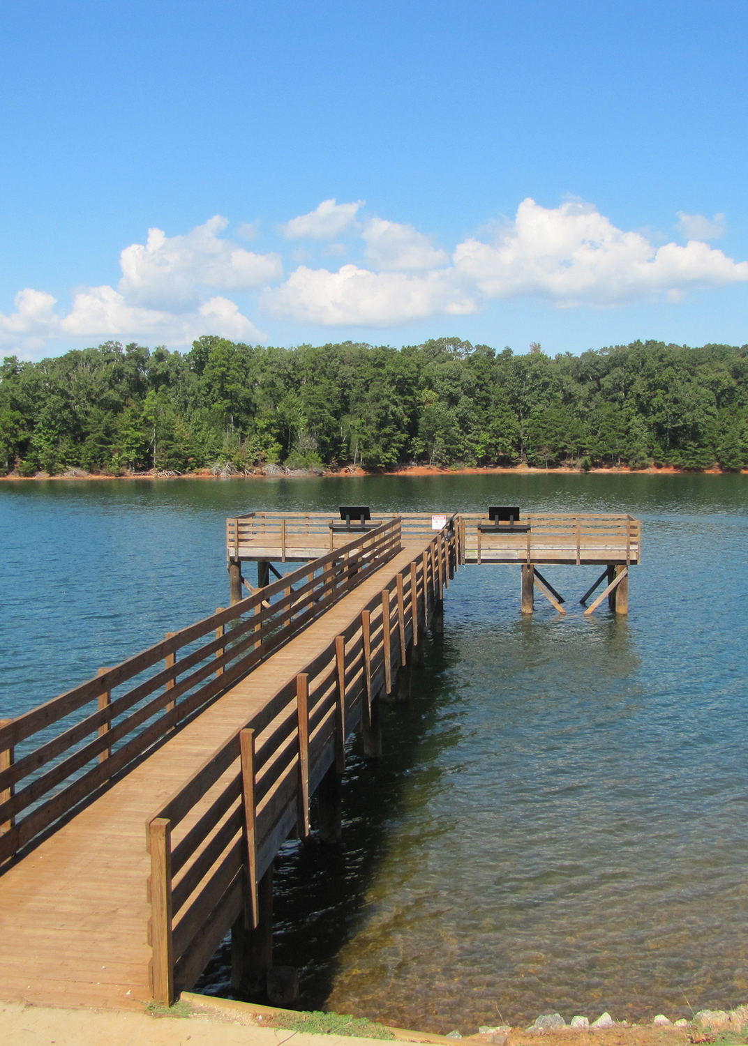 Sadlers Creek State Park dock on a sunny day, overlooking the water.